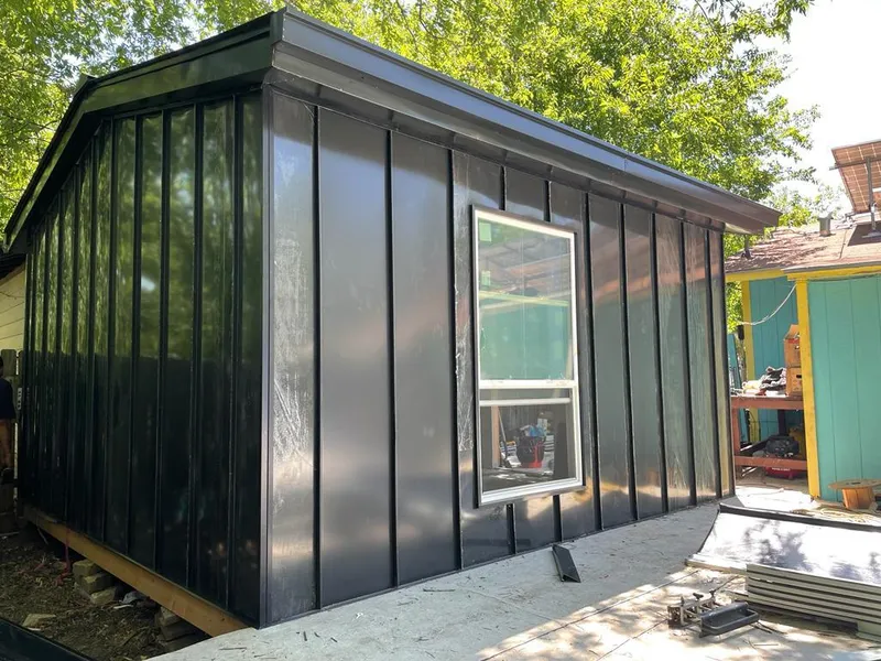 Black standing seam metal wall panels for Roof Inspection in Fruit Heights